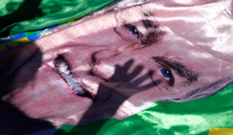 Brazil's Bolsonaro leaves hospital and returns to jail in capital Brasilia