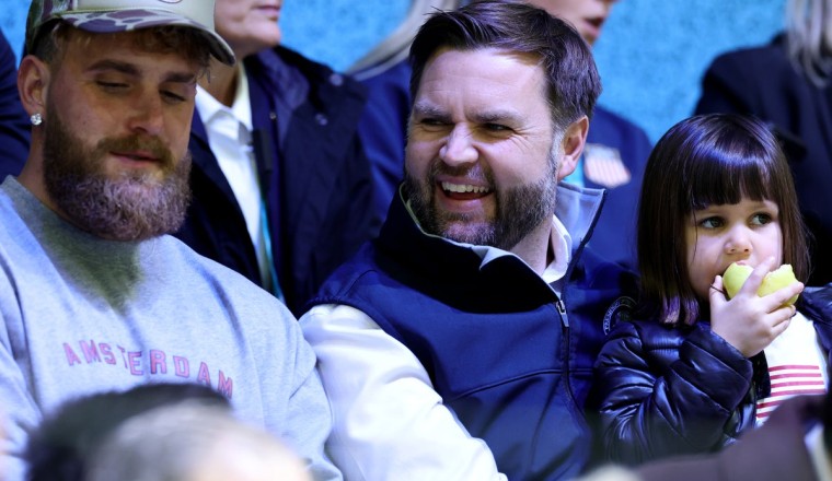 JD Vance and Jake Paul sit together as they watch US women’s hockey at Winter Olympics