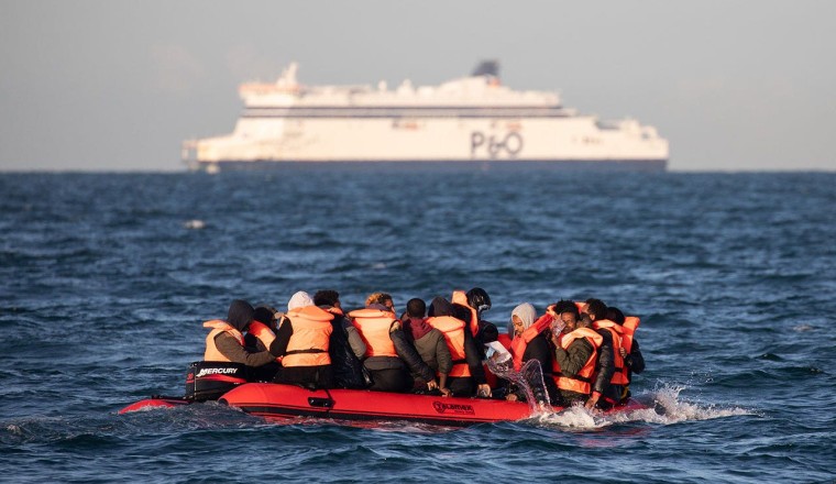 200,000 small boat arrivals loom amid UK raising threat level to ‘severe’ following recent terror attack