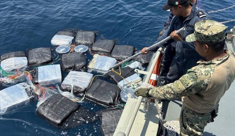Dozens of cocaine packages seized in Pacific, 11 rescued from shipwreck