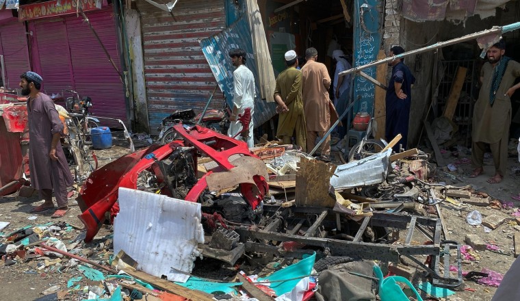 Bomb rigged to rickshaw explodes in Pakistan bazaar, killing 9 and wounding more than 2 dozen others