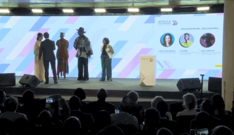 Macron takes the stage uninvited at Africa summit to scold crowd for 'total lack of respect'