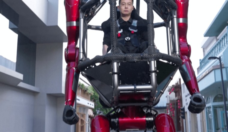 Chinese firm unveils ‘transformer’ style manned robot