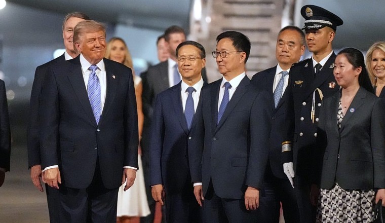 Trump arrives in Bejing for crucial summit, welcomed by Vice President Han