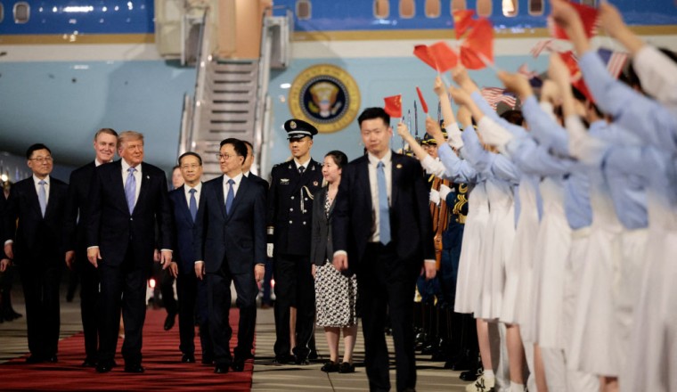 Trump arrives in China for high-stakes talks on trade, Taiwan and Iran war