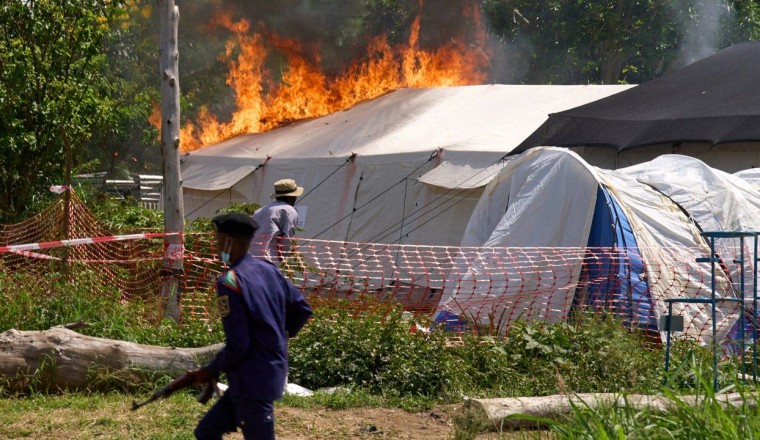 Ebola treatment center set on fire in Congo after residents clash with authorities over victim's body