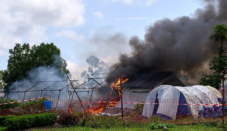 Furious crowd torches Ebola hospital tents in DR Congo