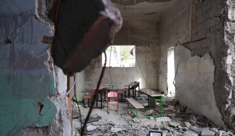 At Iranian school devastated by airstrike, grieving families say they will never forget
