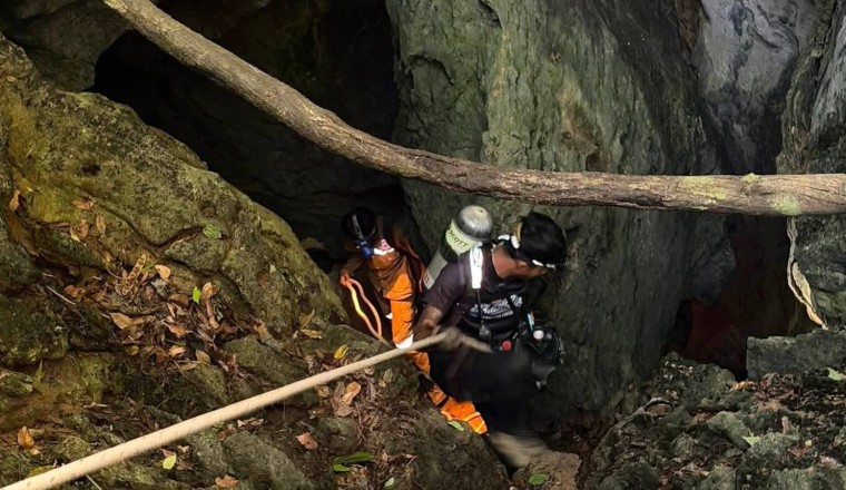 Heavy rains threaten to delay search for 2 people missing in Laos cave