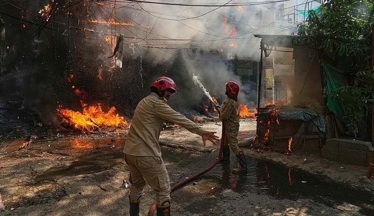 At least 21 people, mostly foreign nationals, killed in New Delhi hotel fire, police say