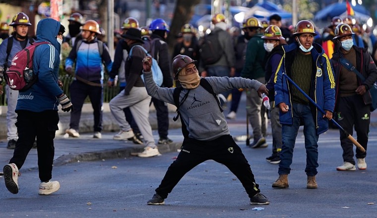 Bolivian ministers resign as weeks of protests against economic crisis rock government