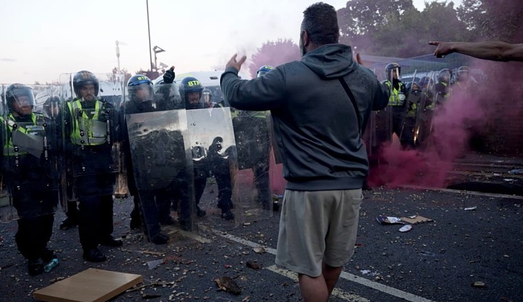 British PM Starmer says Nigel Farage is attempting to 'create division' amid Henry Nowak protests