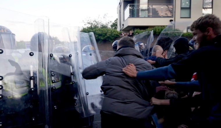 UK government condemns violence at protest over teen's stabbing death