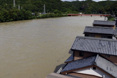 Heavy rain from tropical storm raises flood risks in the Tokyo region
